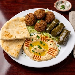 Trio ( Humus,4Dulma,4pc Falafel)
